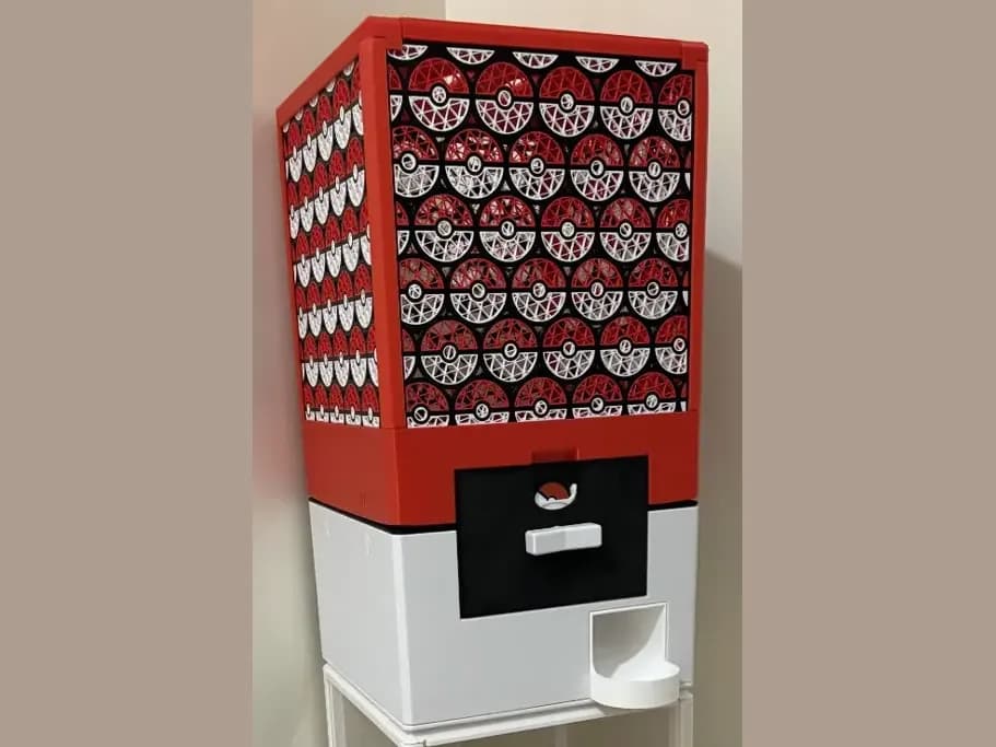 A built GachaPop machine with a Pokeball-pattern panel