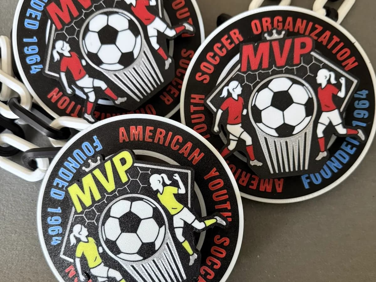 A finished batch of JD3Prints custom team medallions